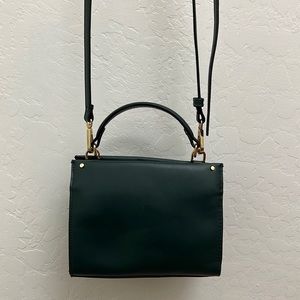 Dark green colored purse